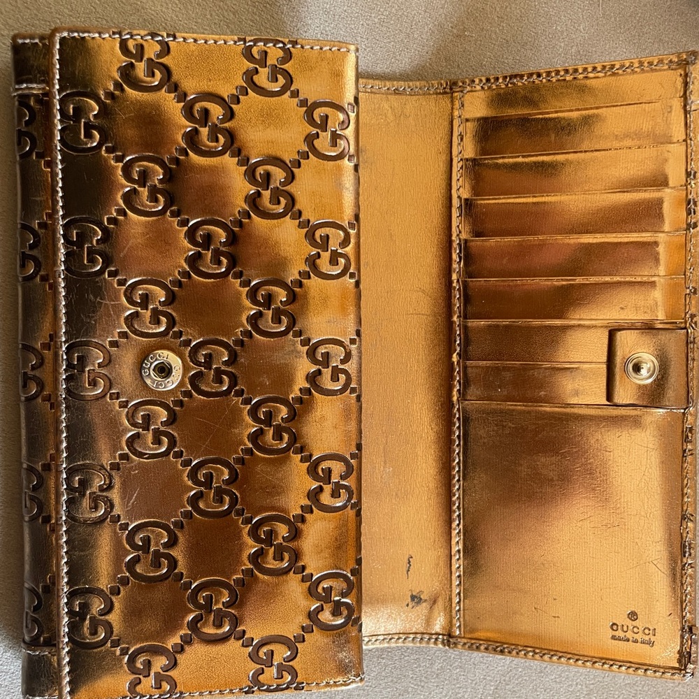 Metallic gold Gucci vintage wallet/clutch